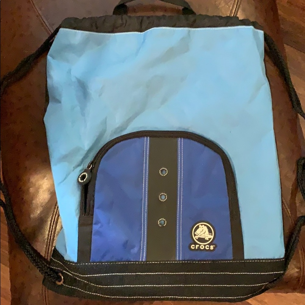 Crocs sling bag with zipper front pocket